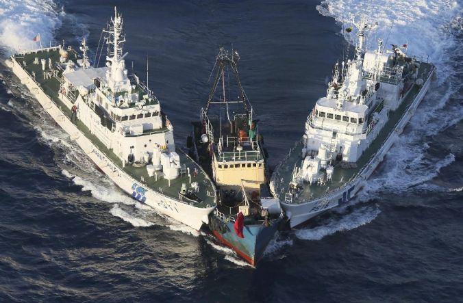 Japan's Coast Guard intercepts an activist Chinese boat on Aug. 15, 2012 near the Senkaku/Diaoyu islands. (AP Photo/Yomiuri Shimbun, Masataka Morita) 